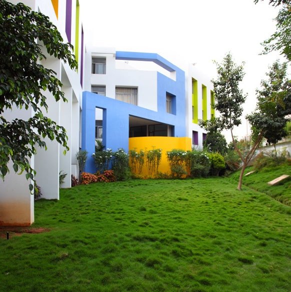 Aerial view of the ABBSSM campus with lush greenery and modern buildings